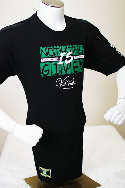 Black graphic T-shirt with green NOTHING IS GIVEN front, VaVichi logo, hem patch