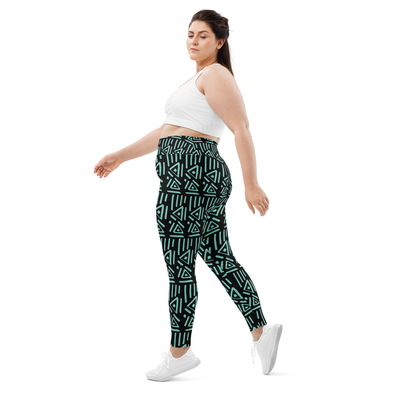 Green tribal print leggings with geometric pattern, side view, ankle length