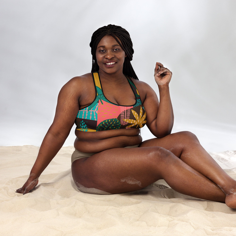 Padded sports bra with colorful leaf geometric print, scoop neck and racer back