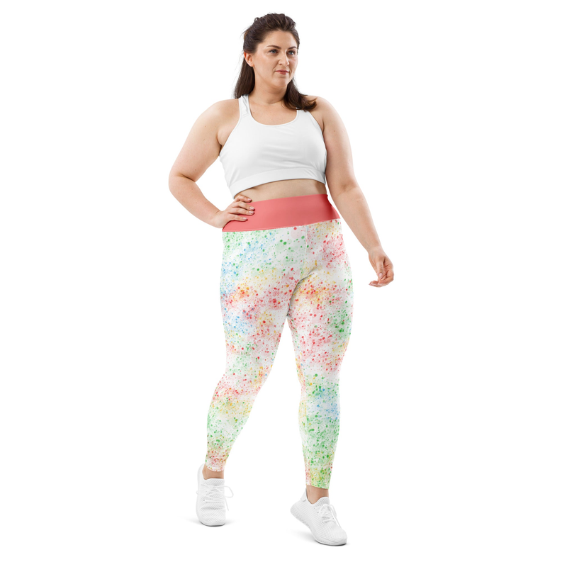 Multicolor speckle print leggings with coral waistband, side view