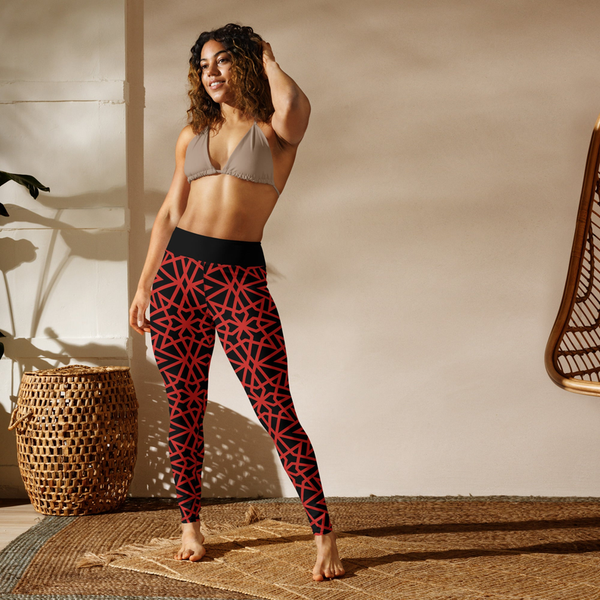 Women's yoga leggings with black base and red geometric pattern, full length