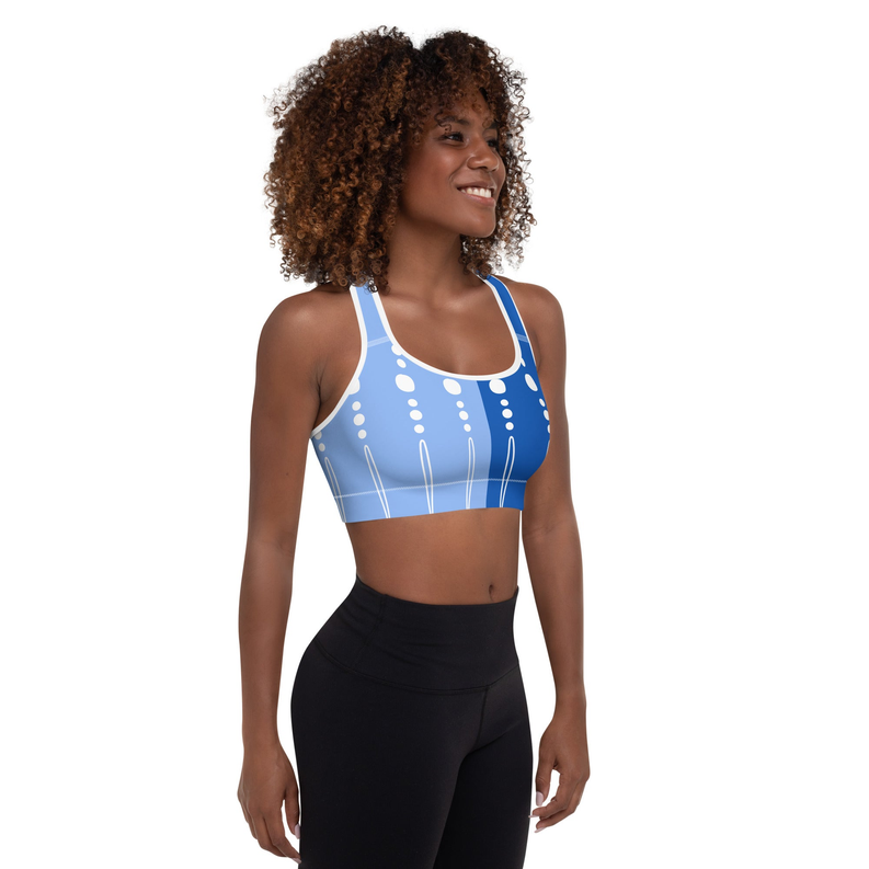 Padded sports bra in blue with white dot-and-line print, wide racerback straps