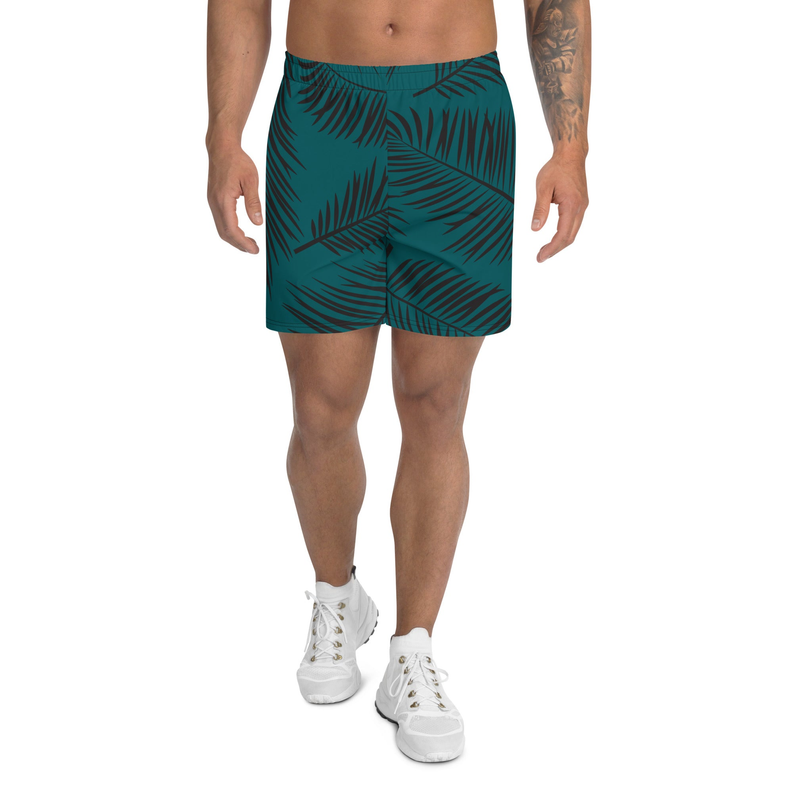 Men’s teal athletic shorts featuring dark tropical leaf print, elastic waistband, above-knee