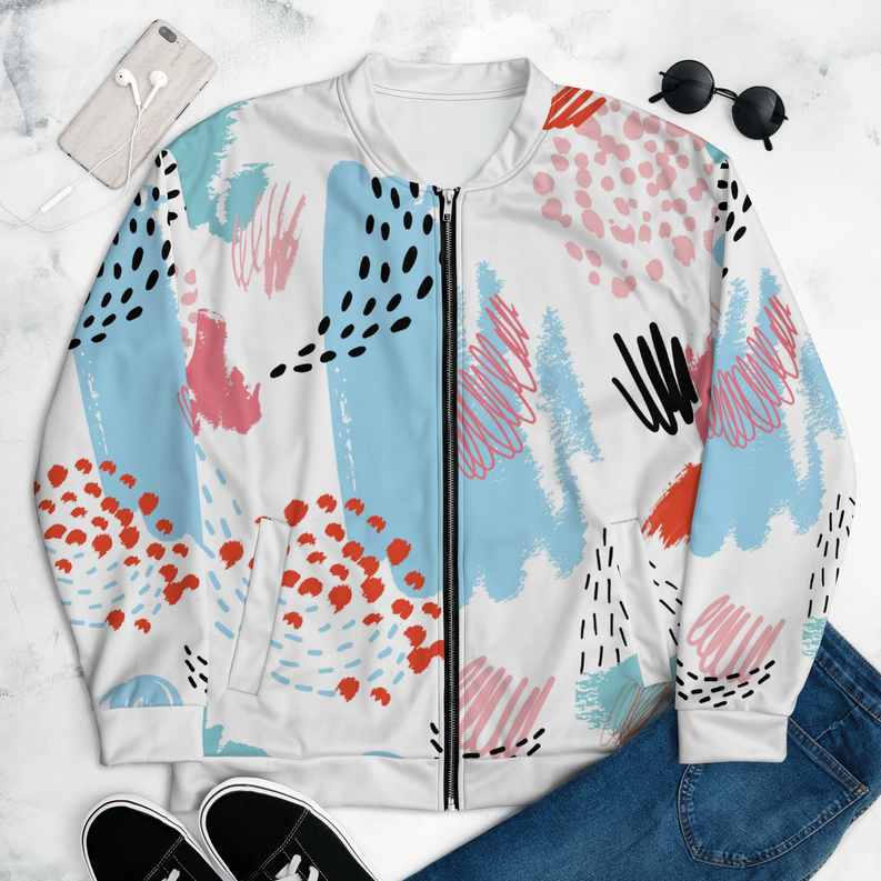White bomber jacket with colorful abstract print, black zipper, ribbed cuffs and hem