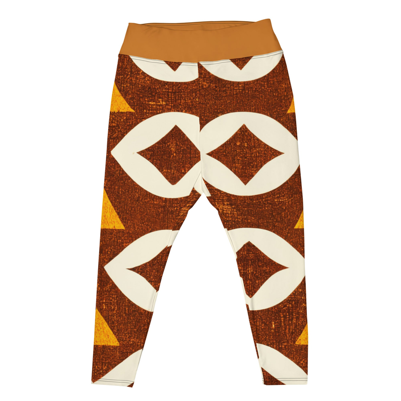 African print leggings with tan waistband and bold white diamond and chevron shapes