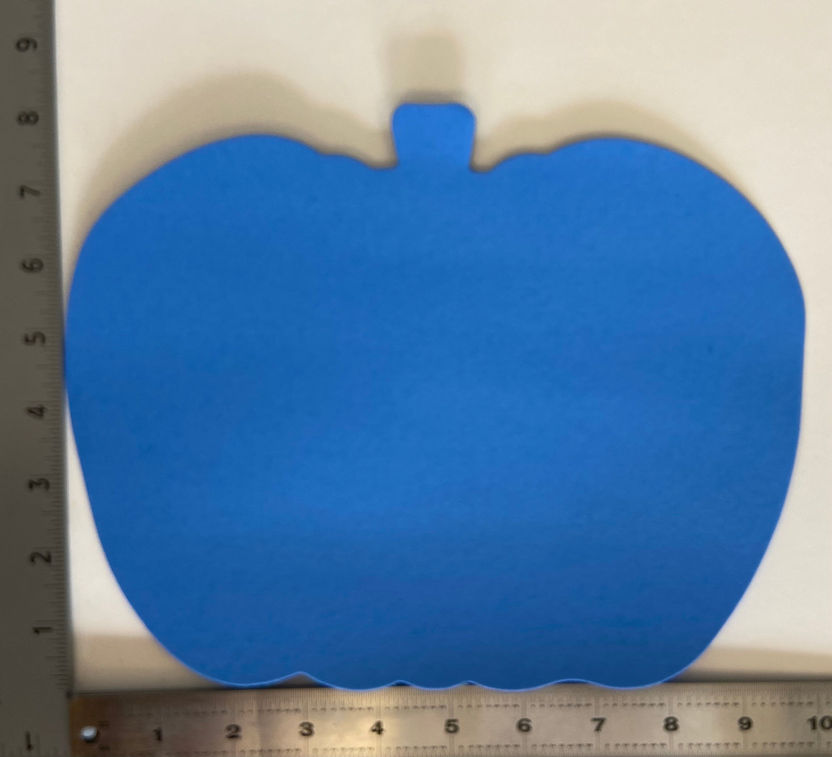 Blue pumpkin cut-out with scalloped edges, simple jack-o'-lantern shape