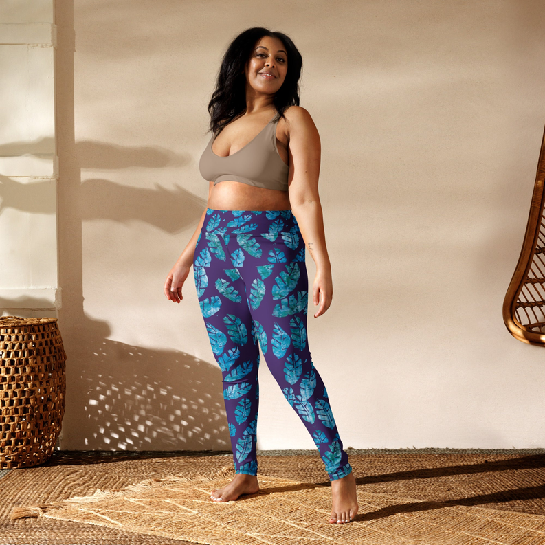 Blue yoga leggings with teal leaf pattern, full-length, side view