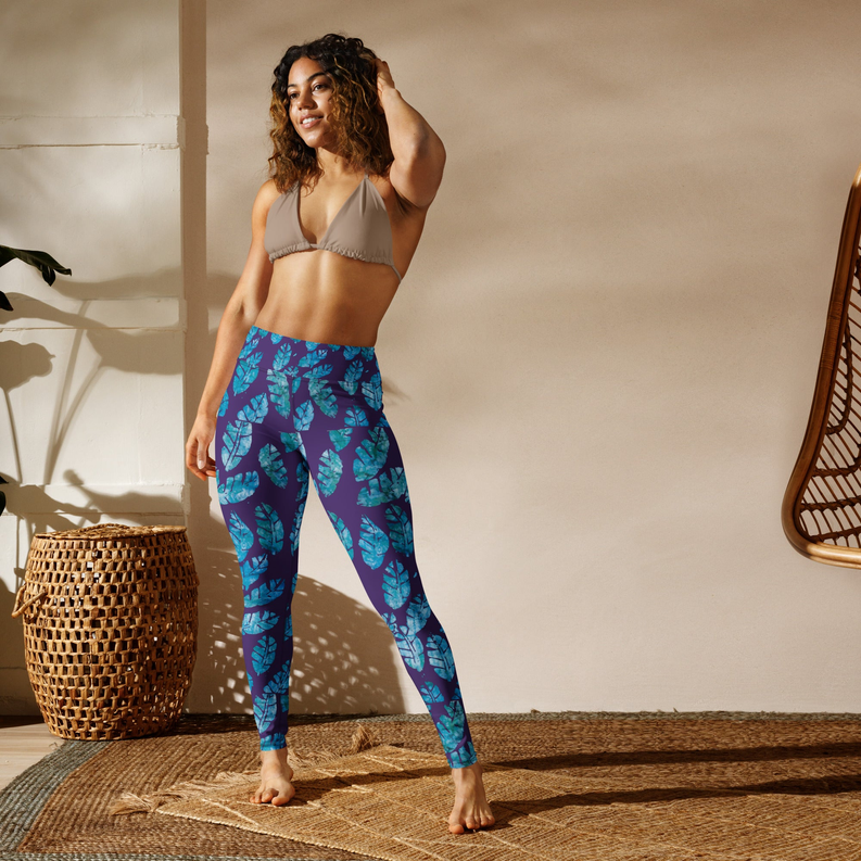 Blue yoga leggings with teal leaf pattern, full-length, snug fit