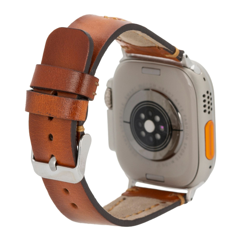 Tan leather Apple Watch band with pin buckle and multiple adjustment holes