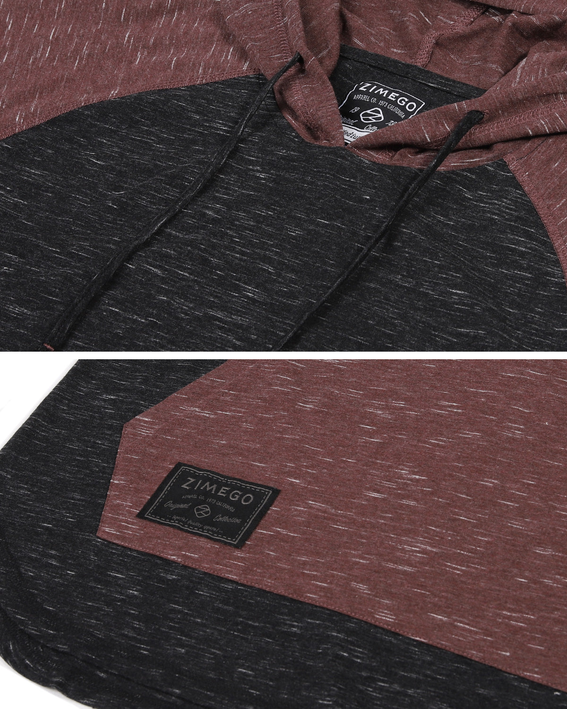 Short-sleeve hoodie close-up with ZIMEGO patch, maroon chest panel on dark charcoal