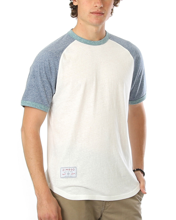 Men's raglan ringer T-shirt worn: white body with blue sleeves and teal neck trim