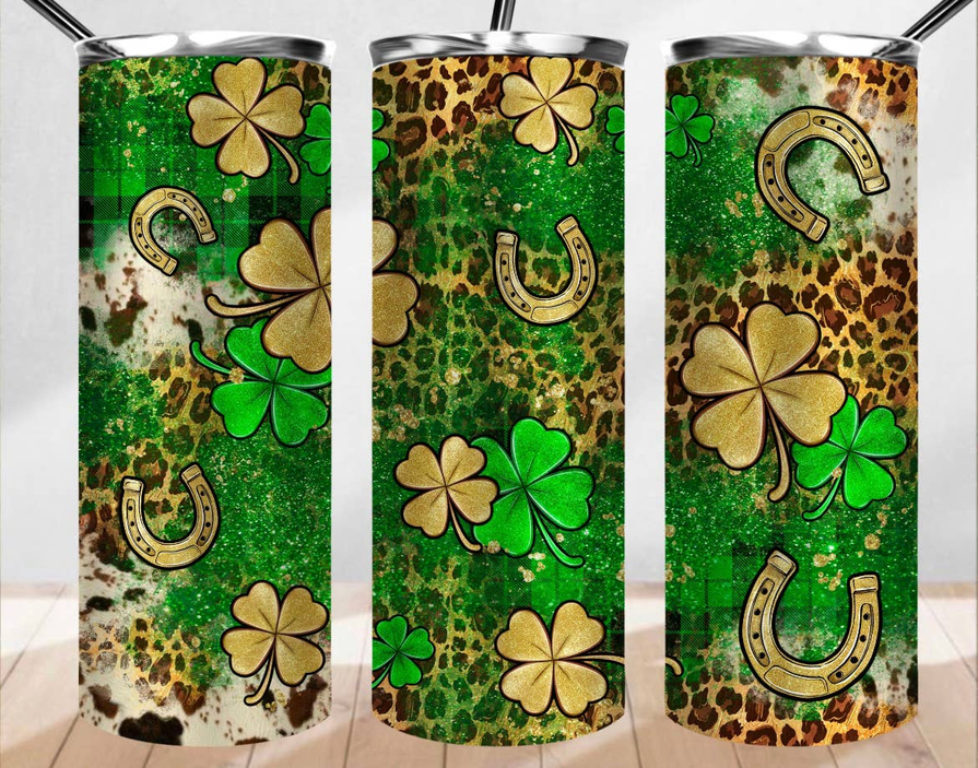 Stainless steel tumbler with green leopard pattern, clovers, flowers, and gold horseshoe