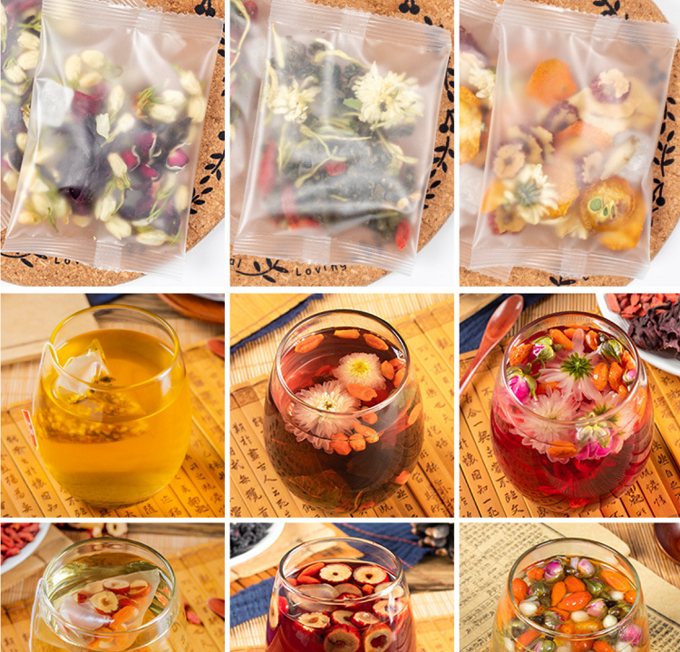 Assorted loose tea packages in clear pouches with dried flowers and fruit pieces