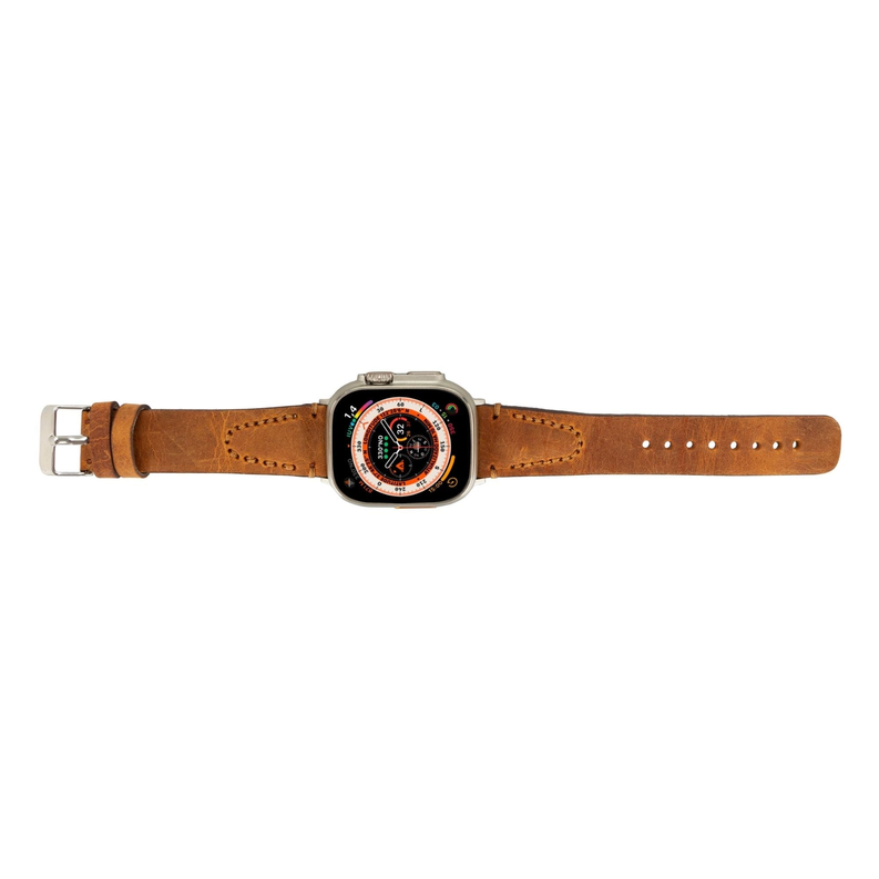 Brown leather watch band with metal buckle, perforated holes, and stitched details