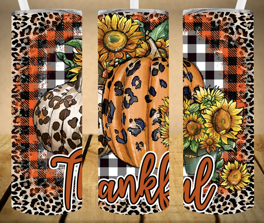 Stainless steel tumbler with sunflower, leopard print, and orange plaid graphic design