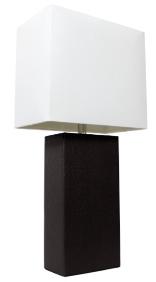 Modern table lamp with white fabric drum shade and textured dark leather base