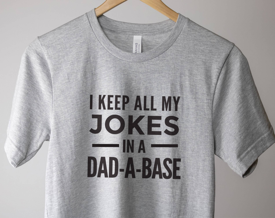 Athletic grey dad joke T-shirt with 'JOKES IN A DAD-A-BASE' print