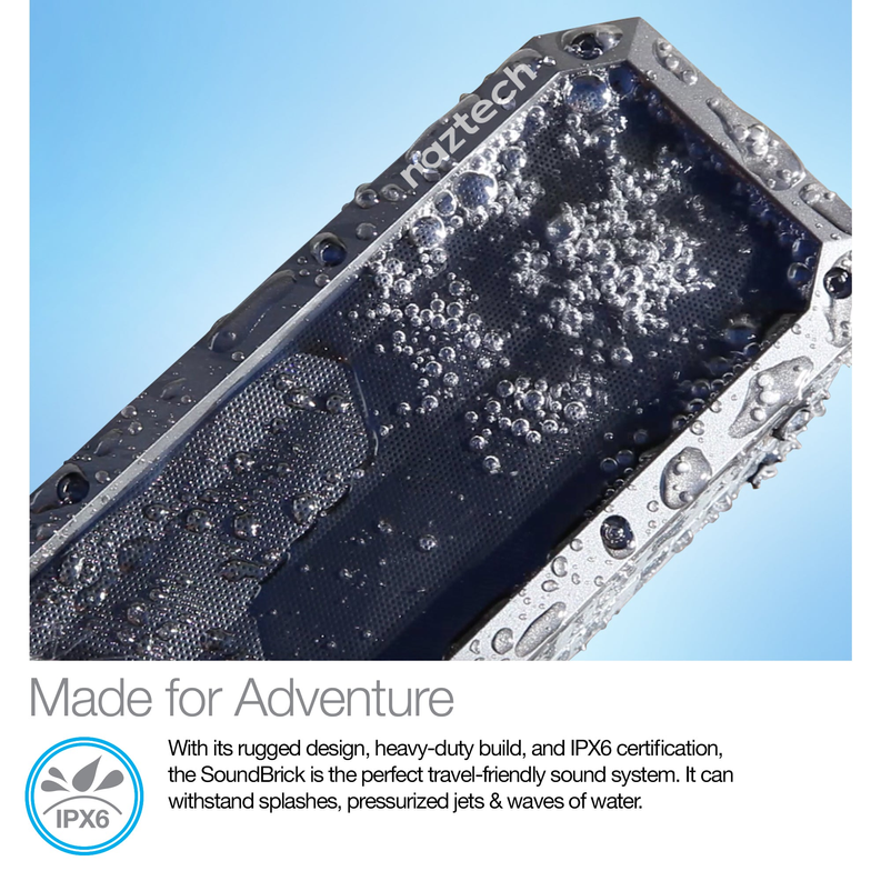 Rugged black wireless speaker with water droplets on mesh grille and edges