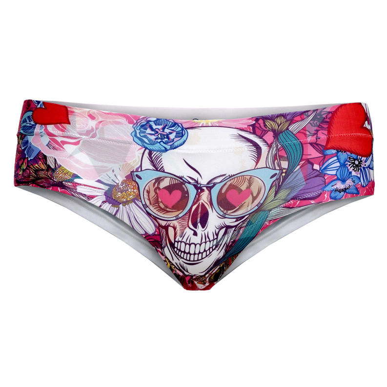 Women’s slip panties, multicolor skull with heart eyes graphic on white background