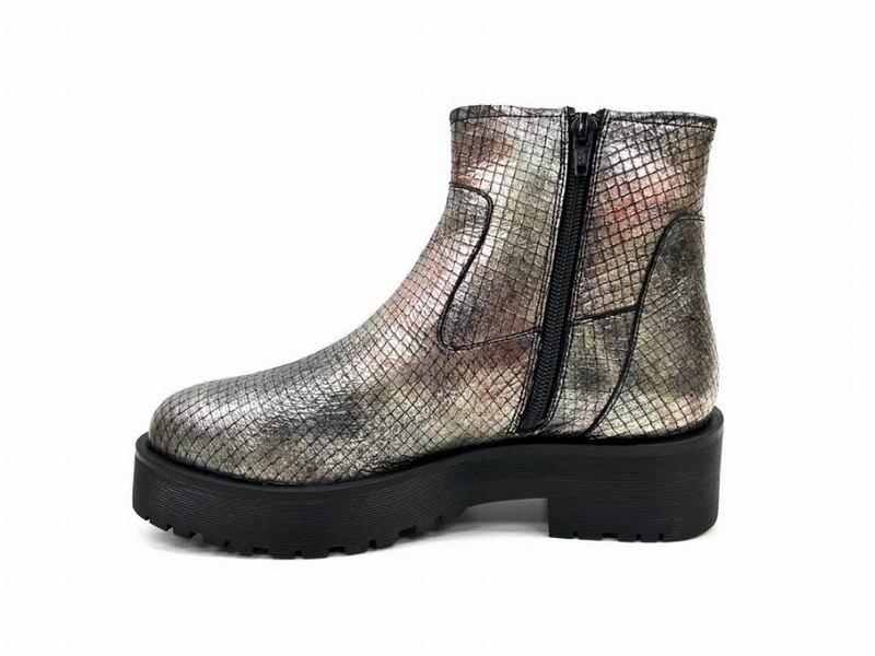 Metallic silver ankle bootie with side zipper and rugged lug tread sole