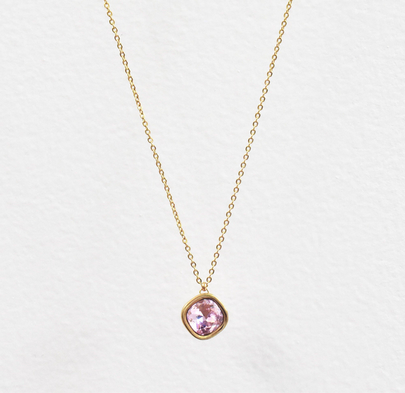 Gold chain pendant with round pink amethyst gemstone, halo bezel setting