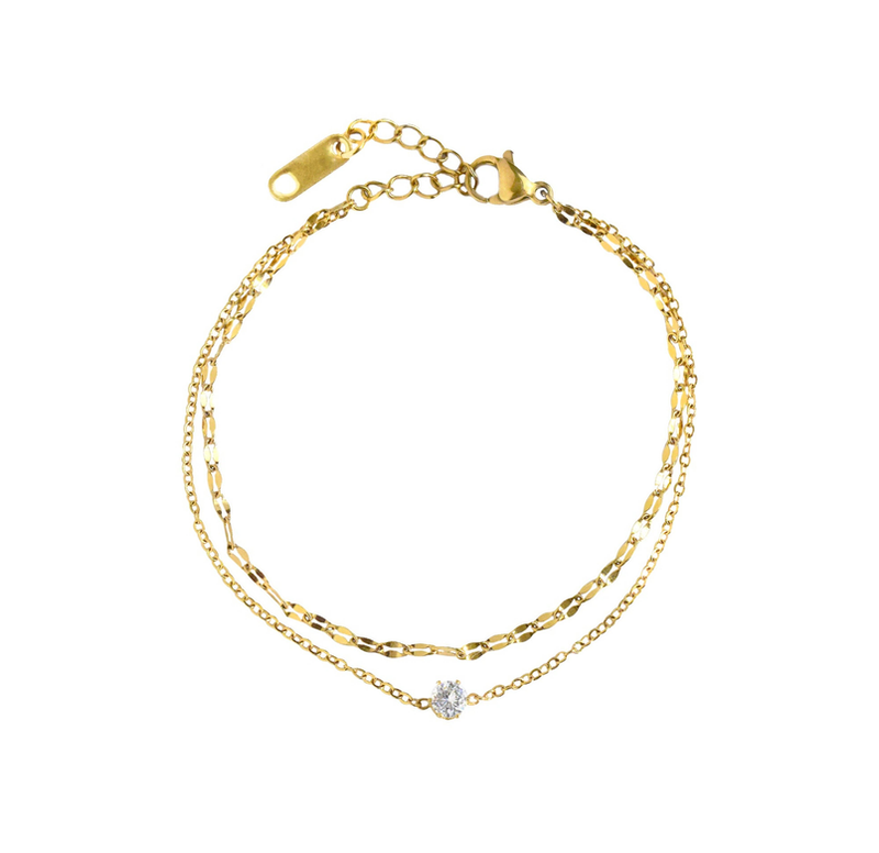 Gold double-chain bracelet with two tiny round clear stones and clasp