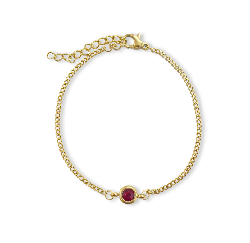 Gold chain bracelet with red round birthstone charm and small clasp links