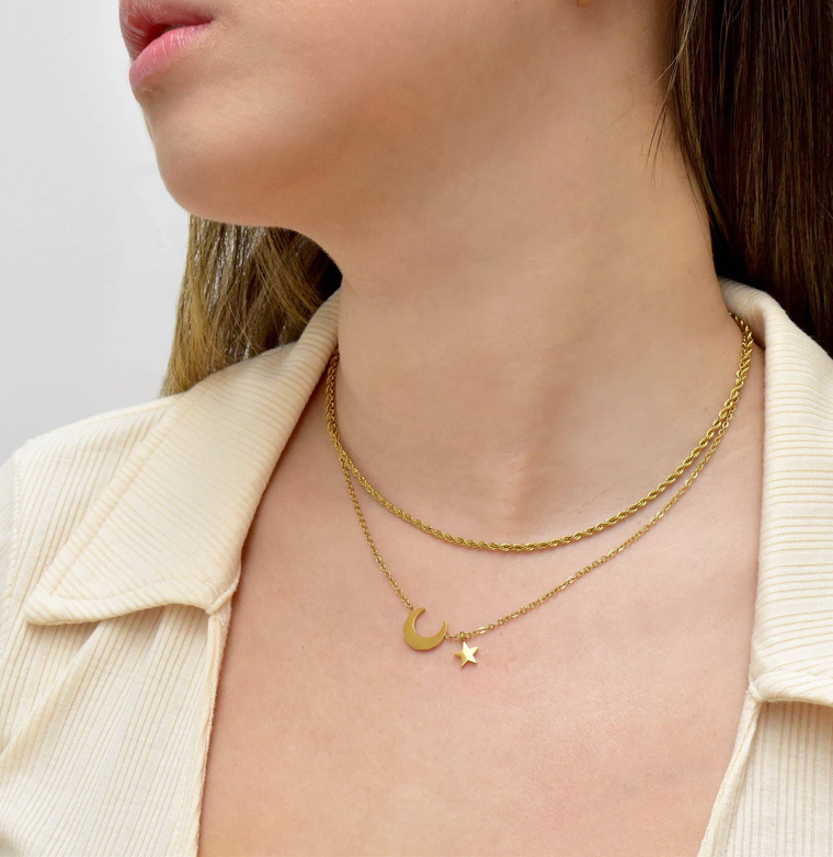 Thin gold rope chain necklace with crescent moon charm and star drop
