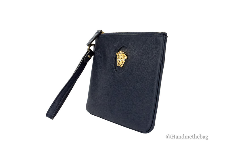 Navy pebbled leather wristlet pouch with wrist strap and gold Medusa emblem