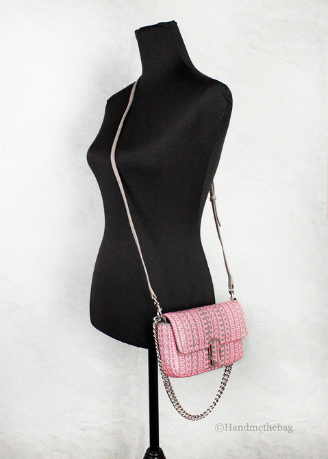 Pink J Marc mini shoulder bag with monogram pattern, silver chain strap, and flap closure.