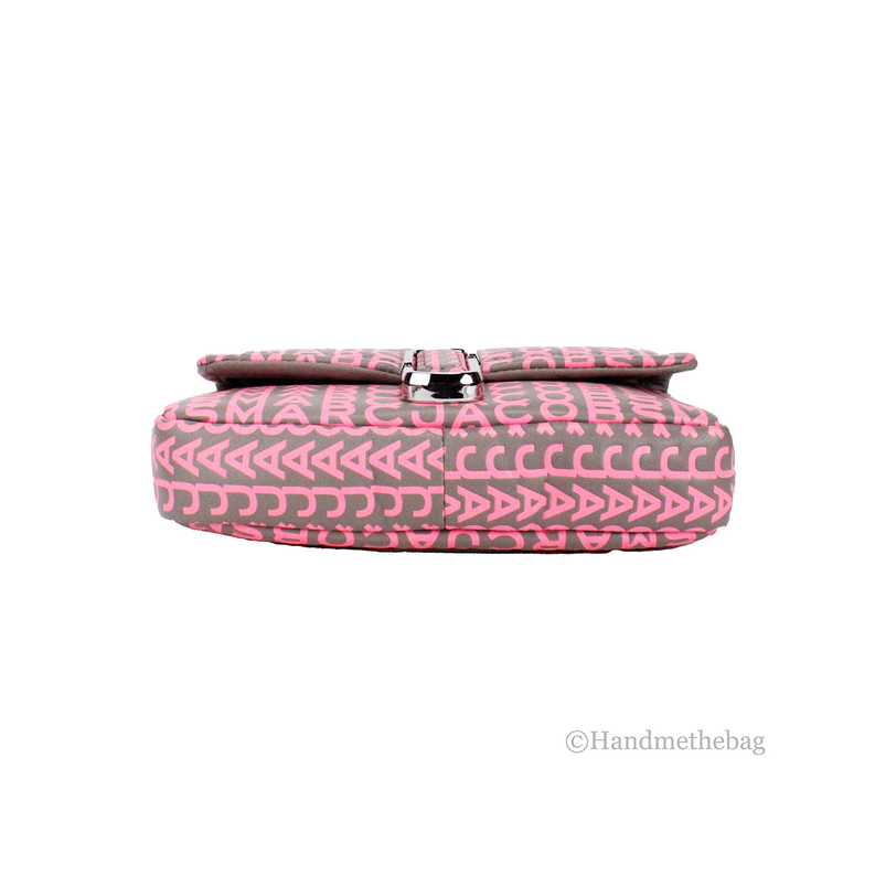 Pink patterned mini shoulder bag with fold-over flap and silver buckle, side view.