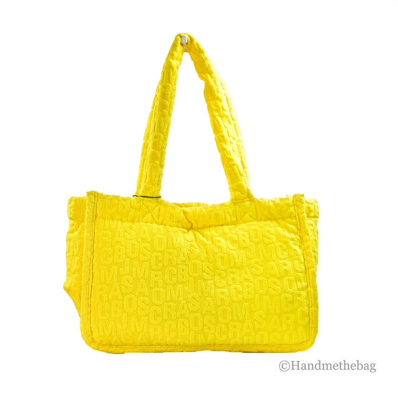 Bright yellow terry monogram tote with two top handles and textured logo pattern