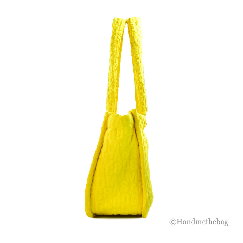 Bright yellow terry monogram tote bag with two top handles, angled side view