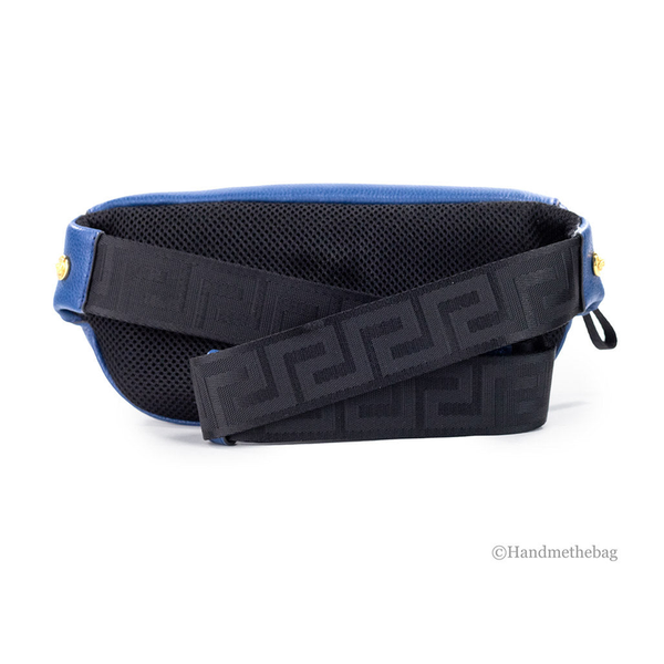 Small leather fanny pack with black logo strap and navy body, zippered front