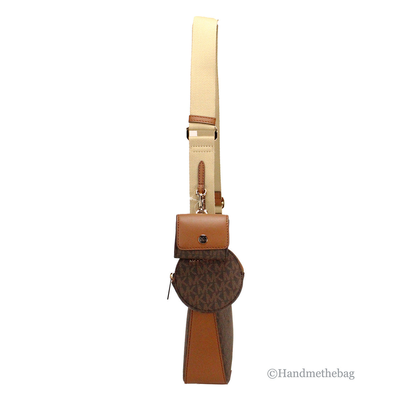 Brown crossbody bag with round logo charm and attached vertical leather pouch