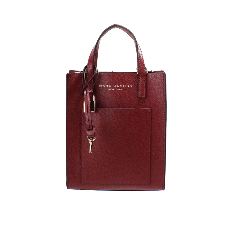 Micro mini leather crossbody bag in pomegranate red with front logo plaque and key charm