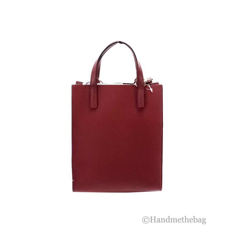 Micro mini leather crossbody bag in pomegranate red, front view with top handles