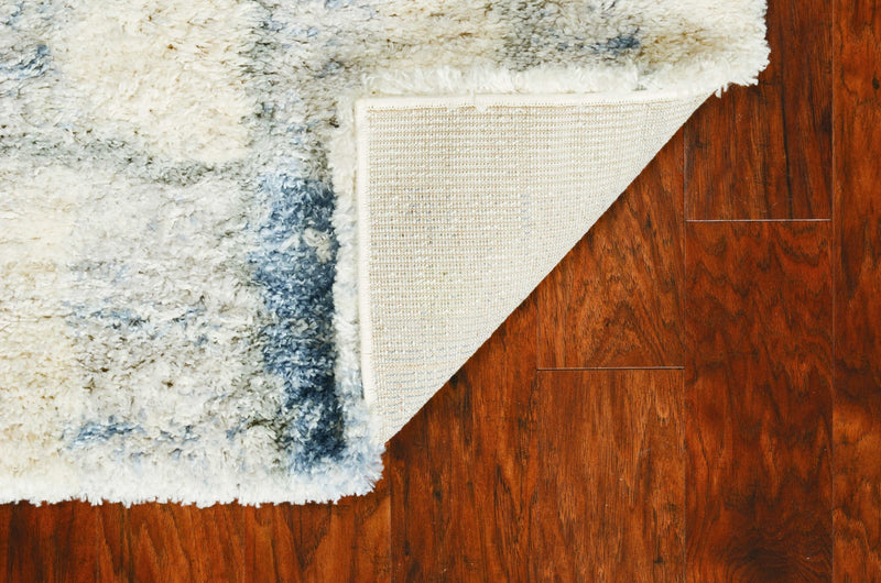 5' X 8' Ivory And Blue Abstract Area Rug - Home Decor