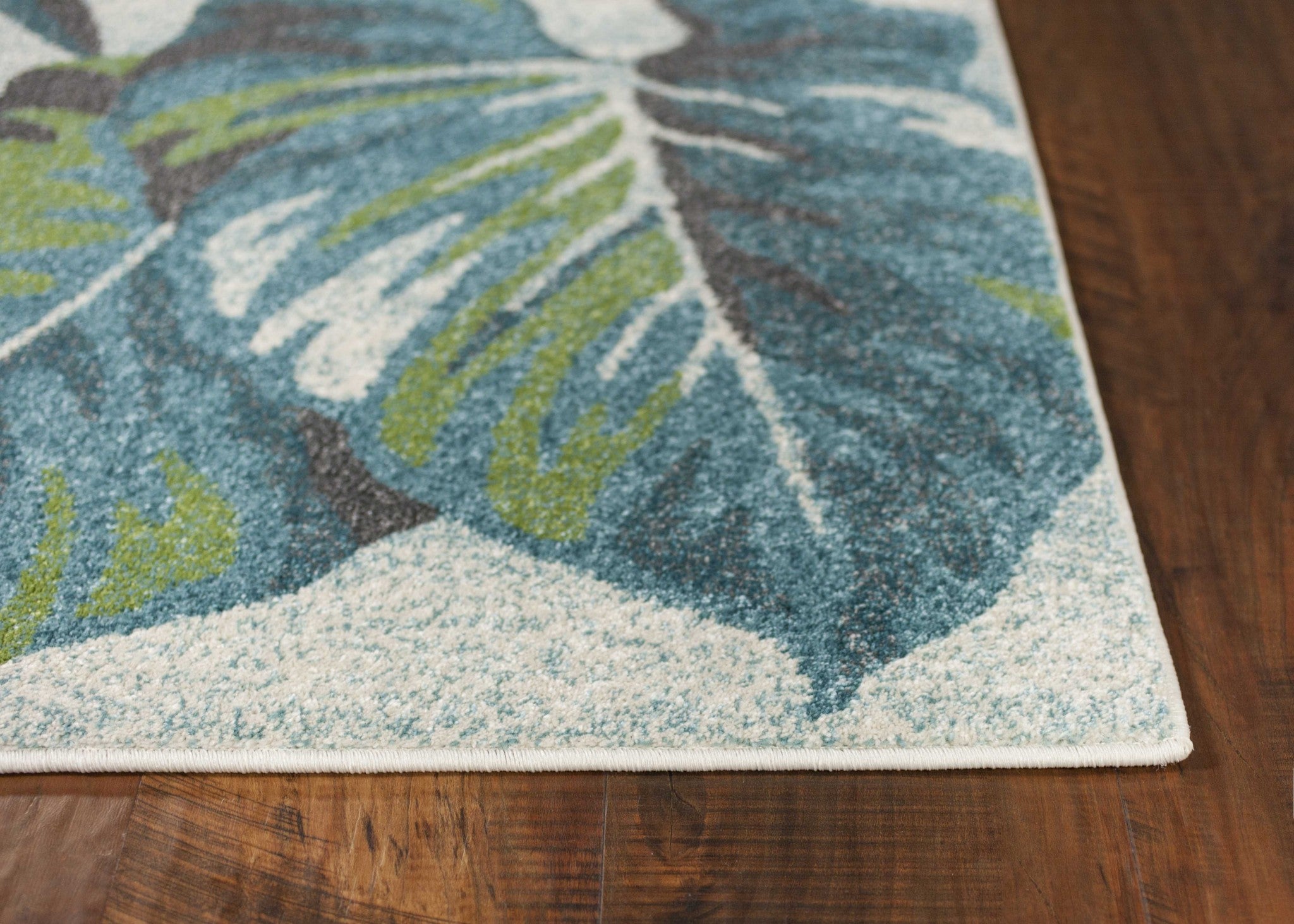 5' X 8' Beige Teal And Green Tropical Botanical Area Rug - Home Decor