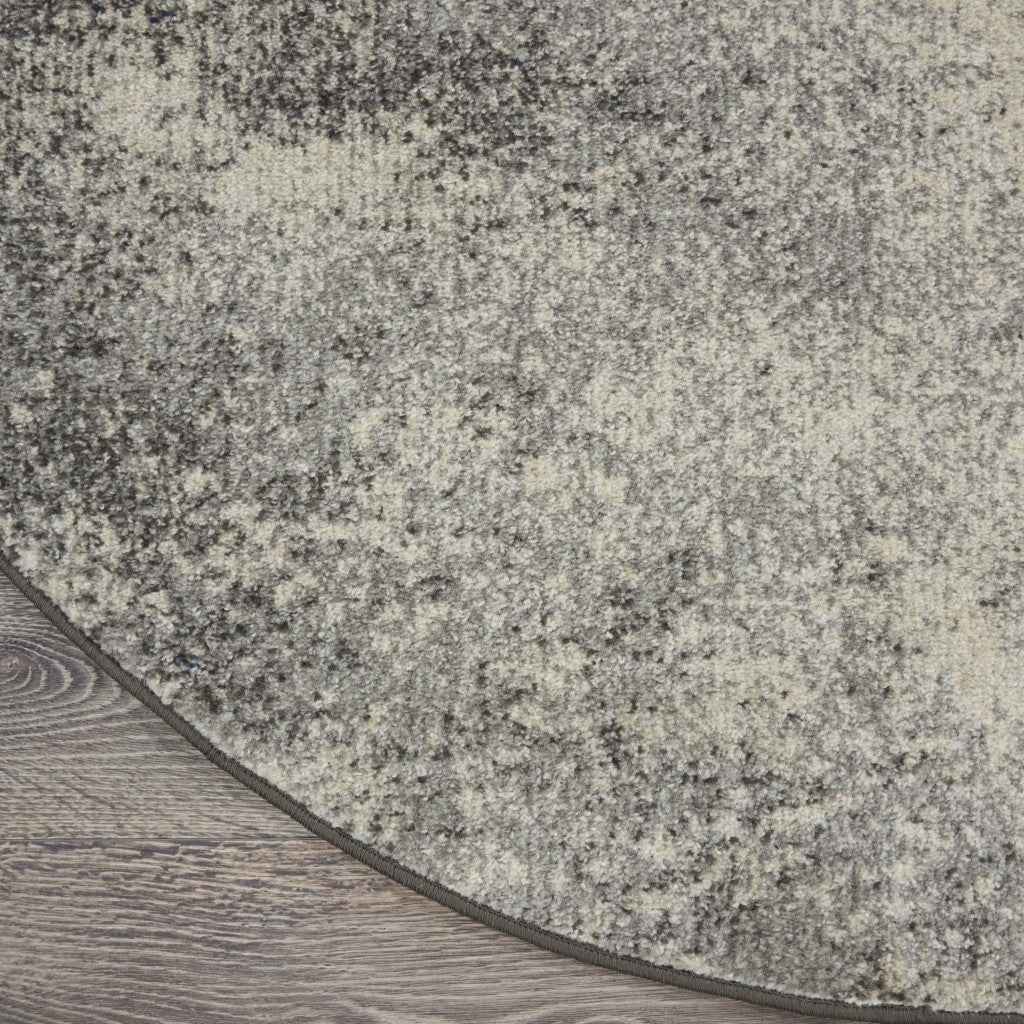5' Gray And Ivory Round Abstract Power Loom Area Rug