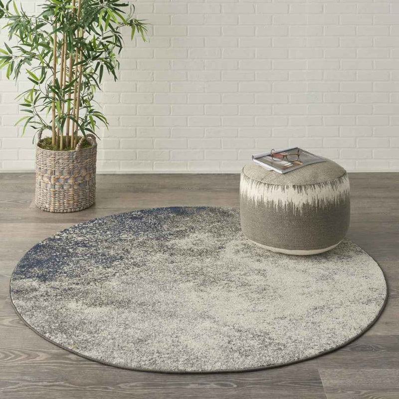 5' Gray And Ivory Round Abstract Power Loom Area Rug