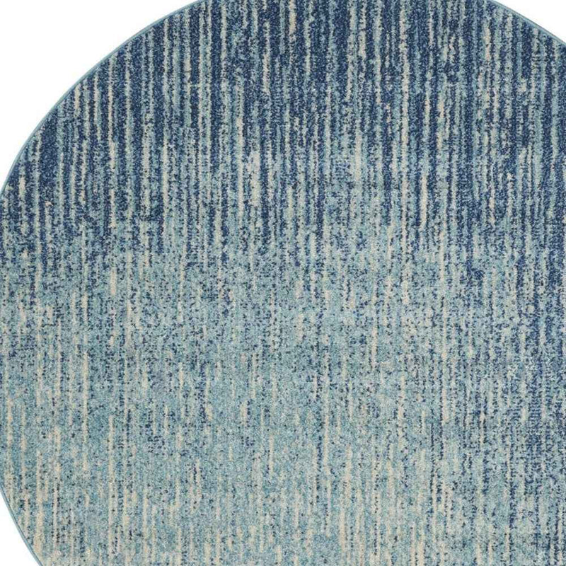 5' Ivory And Blue Round Abstract Power Loom Area Rug
