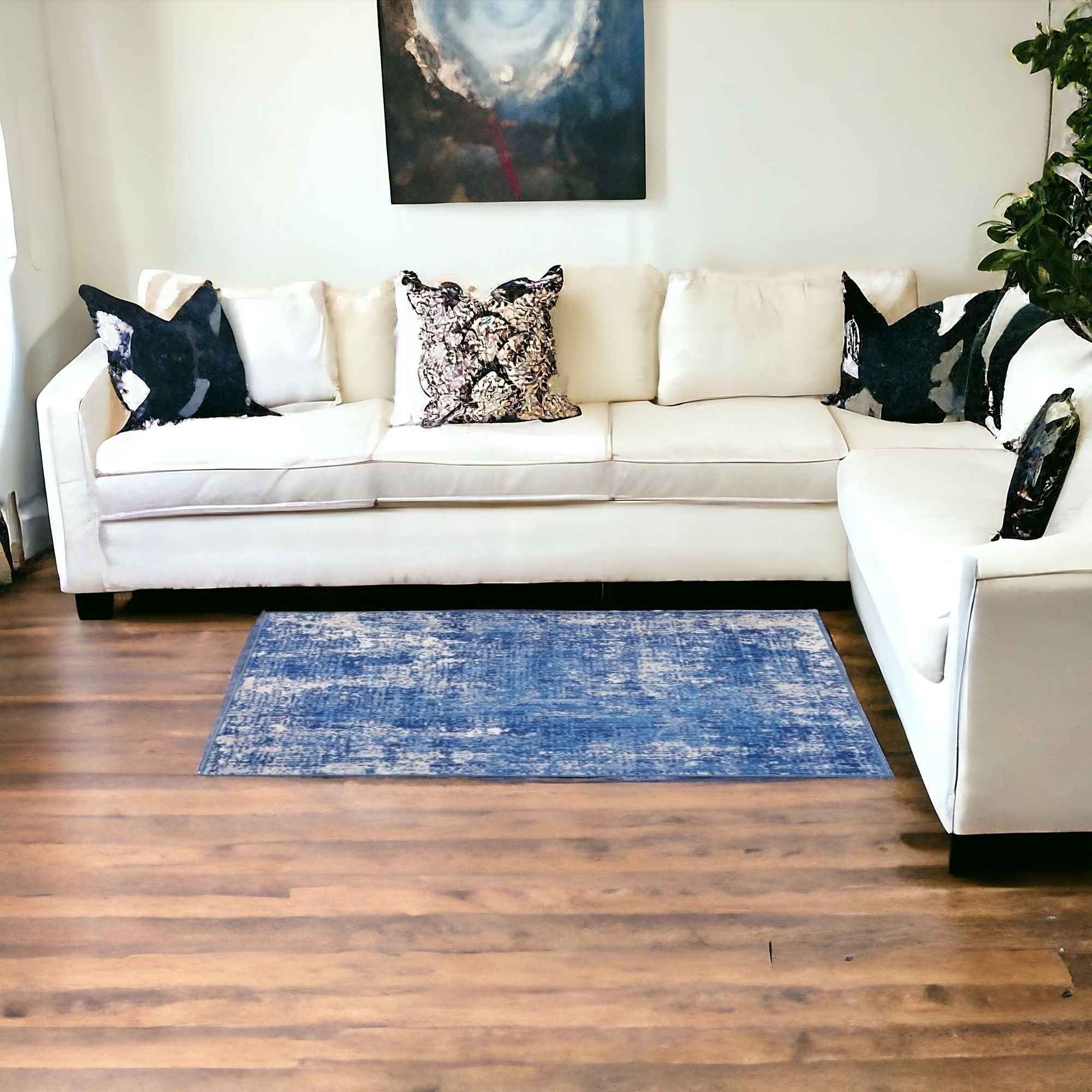 5' X 7' Blue And Ivory Abstract Dhurrie Area Rug