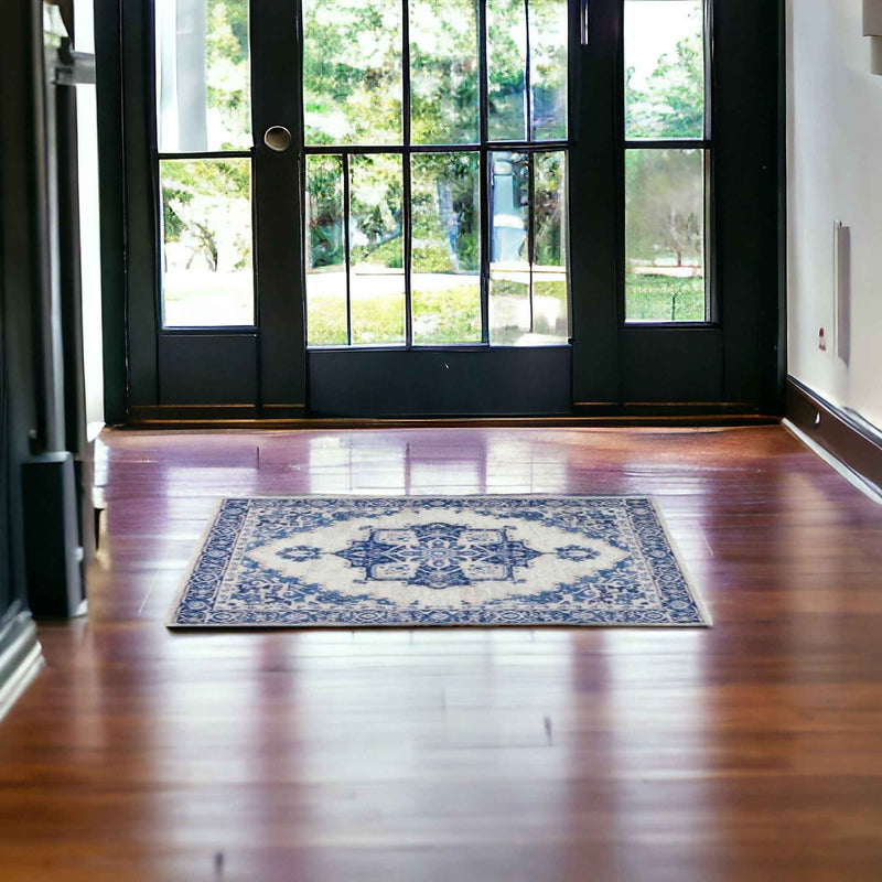 6' X 9' Blue And Ivory Floral Dhurrie Area Rug