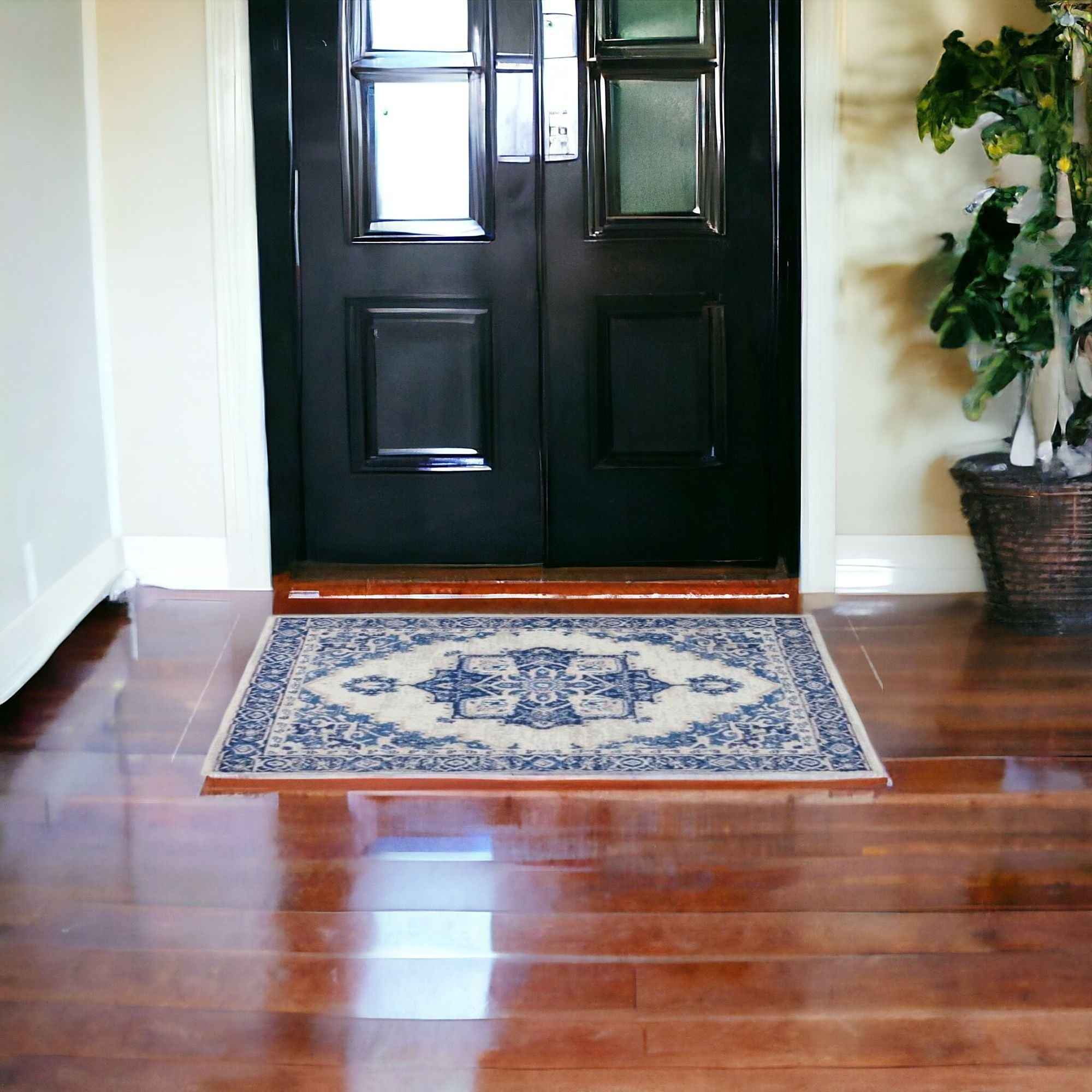 6' X 9' Blue And Ivory Floral Dhurrie Area Rug