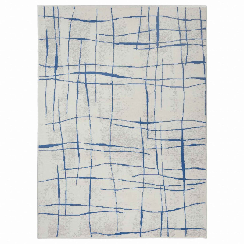 5' X 7' Blue And Ivory Abstract Dhurrie Area Rug