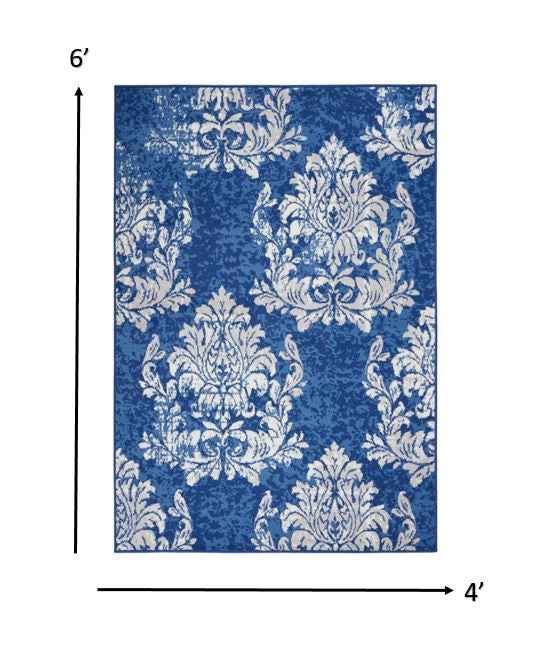 4' X 6' Blue And Ivory Floral Dhurrie Area Rug