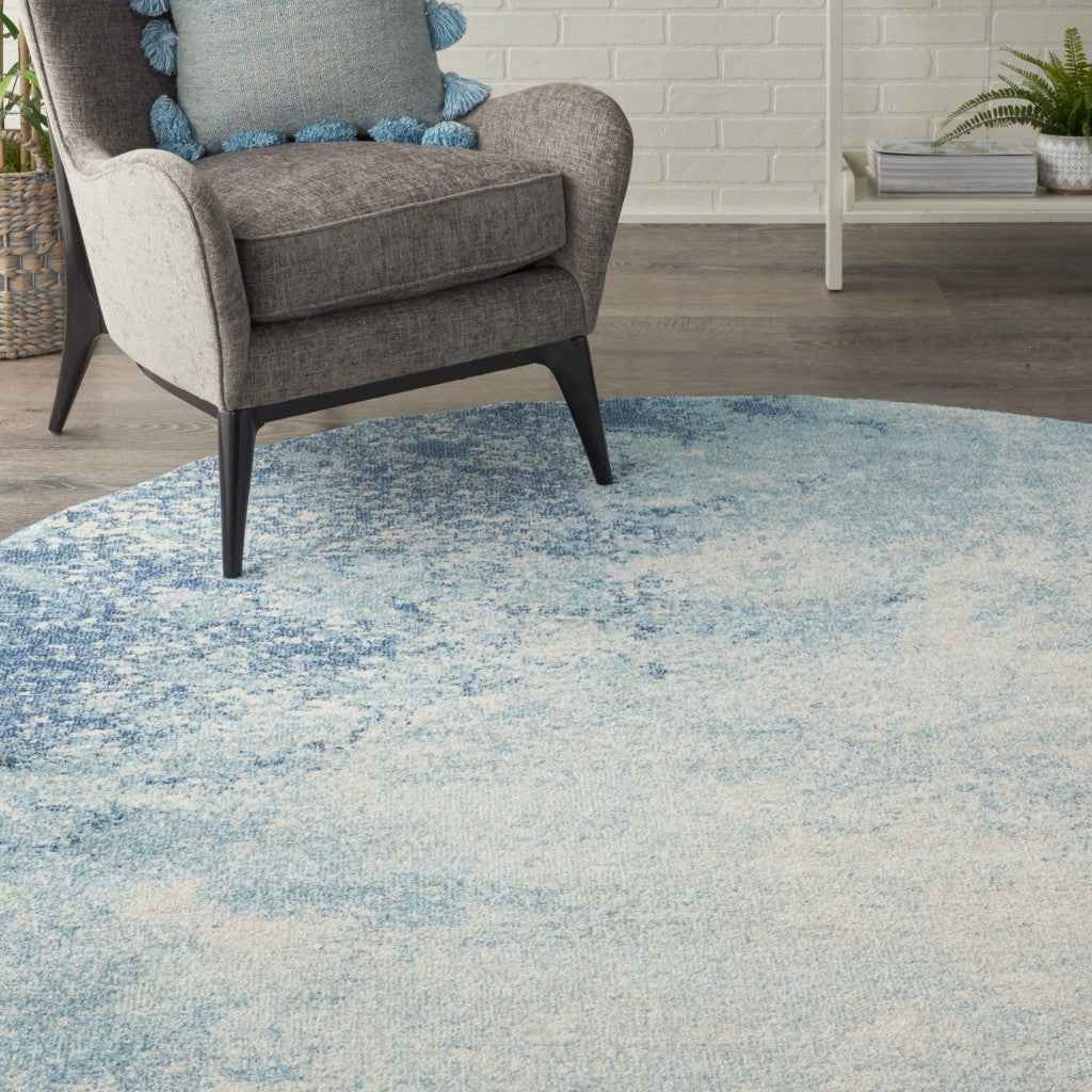 8' Ivory And Blue Round Abstract Power Loom Area Rug