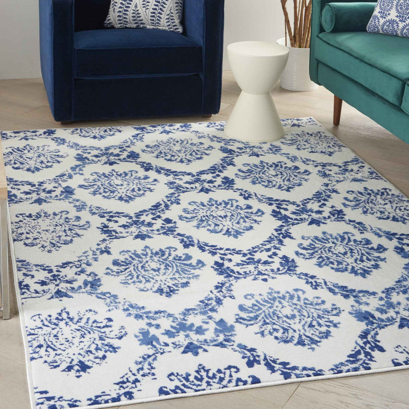 4' X 6' Blue And Ivory Floral Dhurrie Area Rug