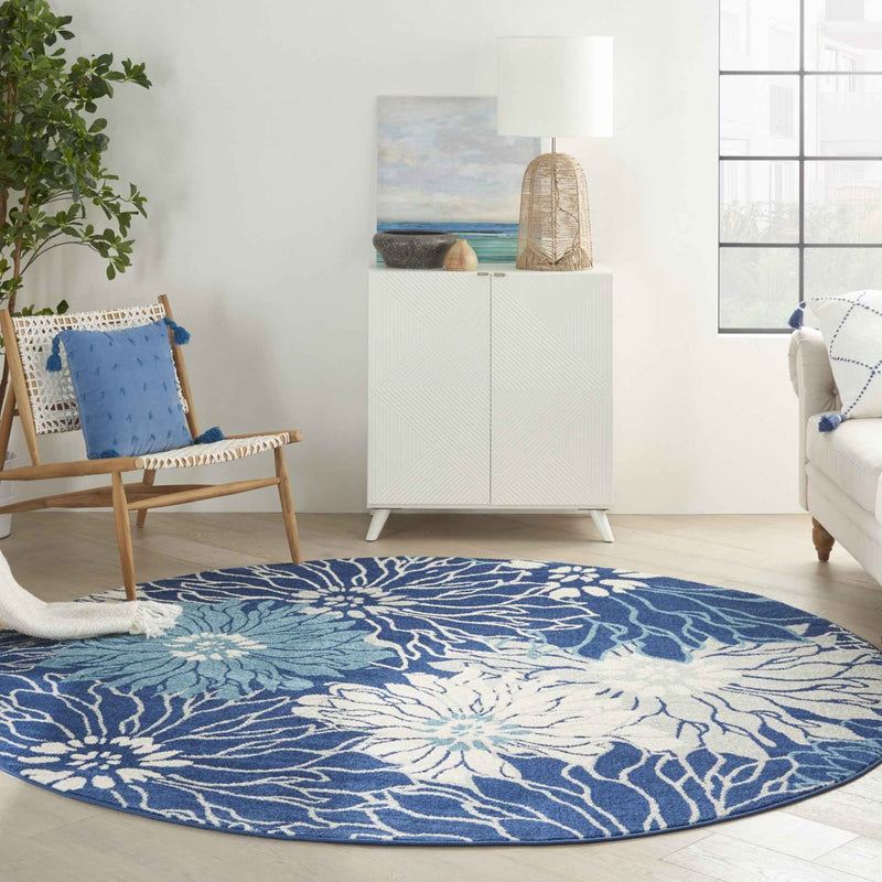 8' Blue And Ivory Round Floral Dhurrie Area Rug